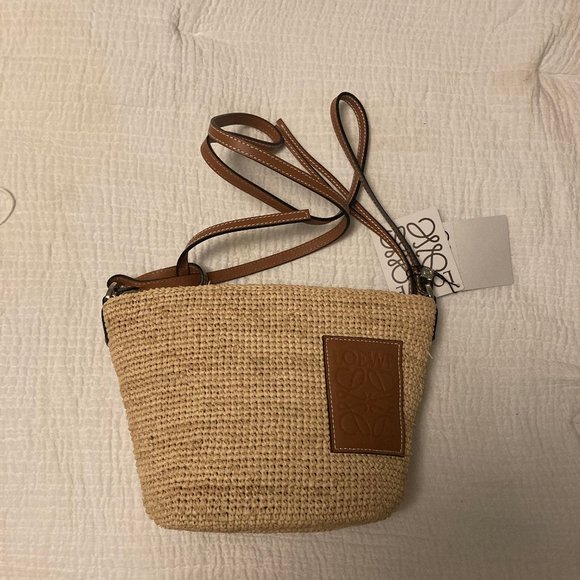 loewe pochette bag in raffia and calfskin